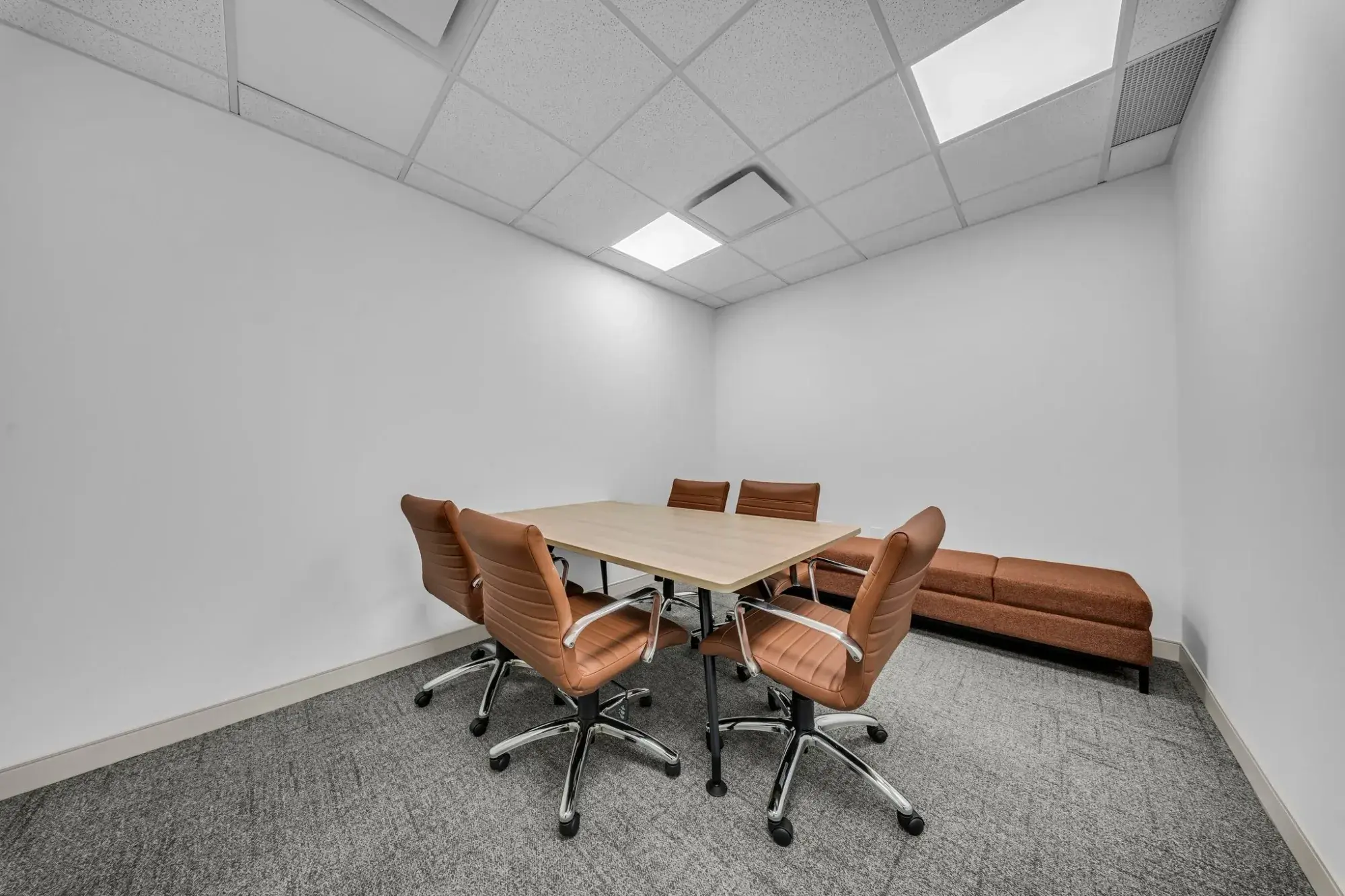 Meeting room with full-height glazing at Workplace K, 1940 Eglinton Ave, Scarborough
