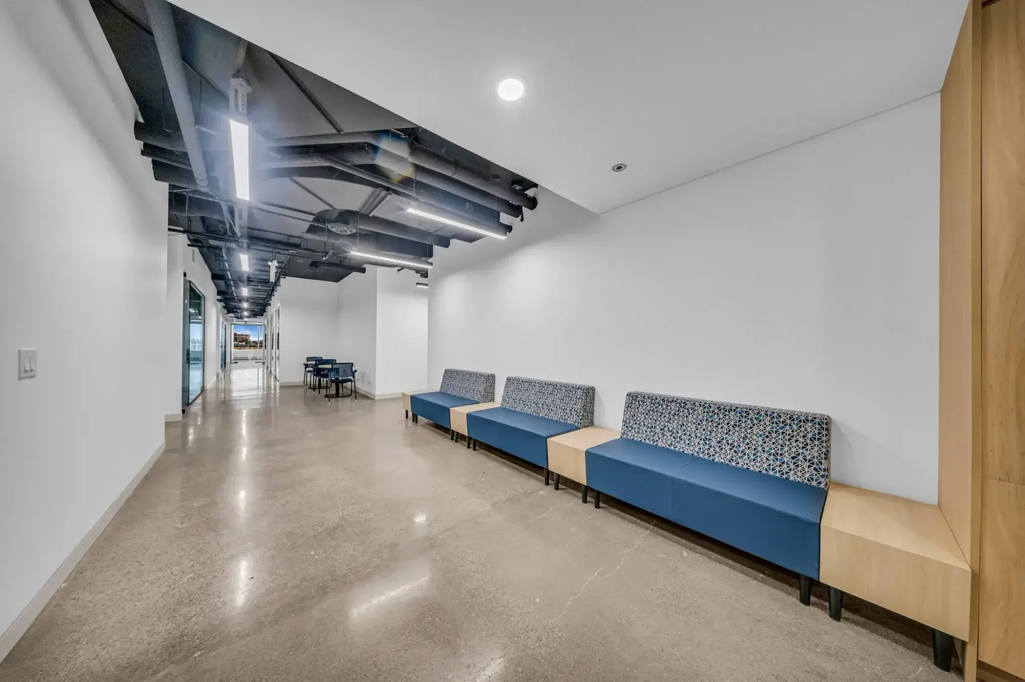 Bright, glazed lounge corridor at Workplace K, 1940 Eglinton Ave, Scarborough